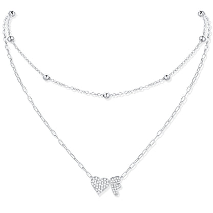Silver CZ initial F necklace with a heart-shaped pendant on a white background
