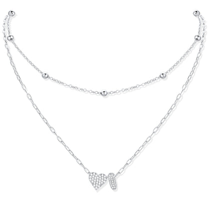 Silver CZ initial I necklace with a heart-shaped pendant on a white background