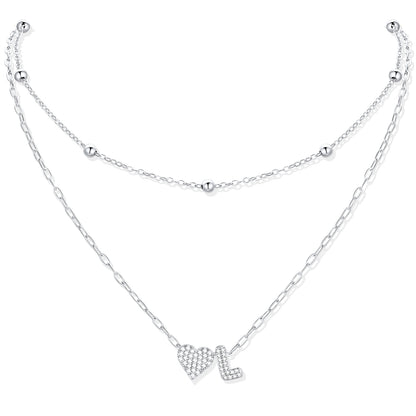 Silver CZ initial L necklace with a heart-shaped pendant on a white background