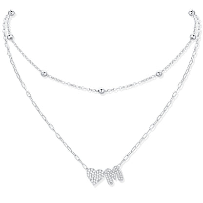 Silver CZ initial M necklace with a heart-shaped pendant on a white background