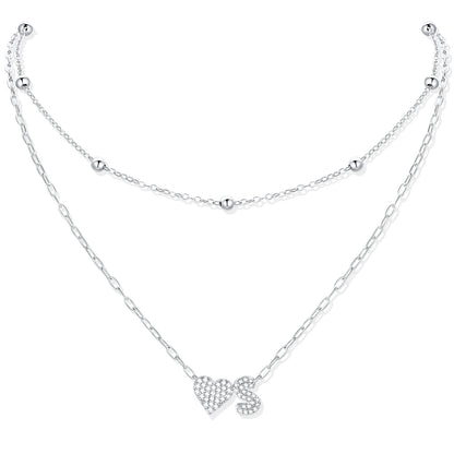 Silver CZ initial S necklace with a heart-shaped pendant on a white background