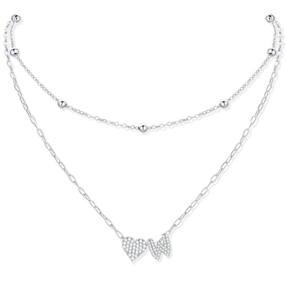 Silver CZ initial W necklace with a heart-shaped pendant on a white background