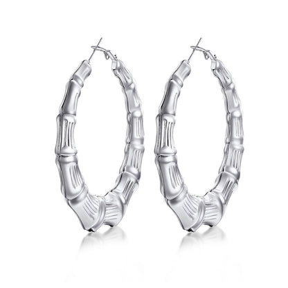 Silver Chunky hoop earrings on a white background