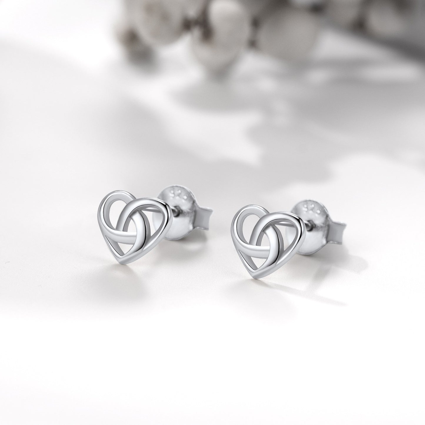 Silver Heart Celtic Knot Stud Earrings on a white background