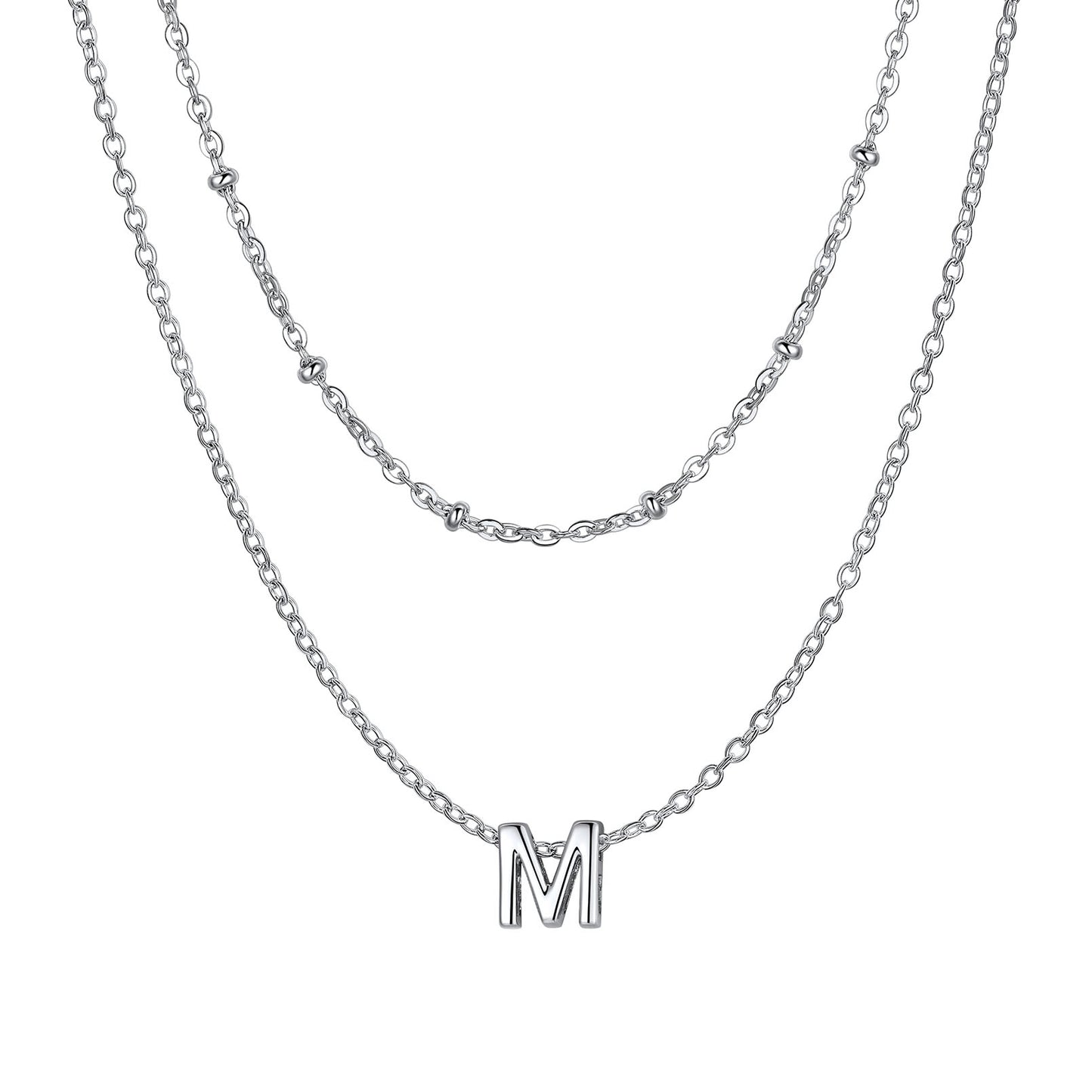 Silver Layered initial M necklace on a white background