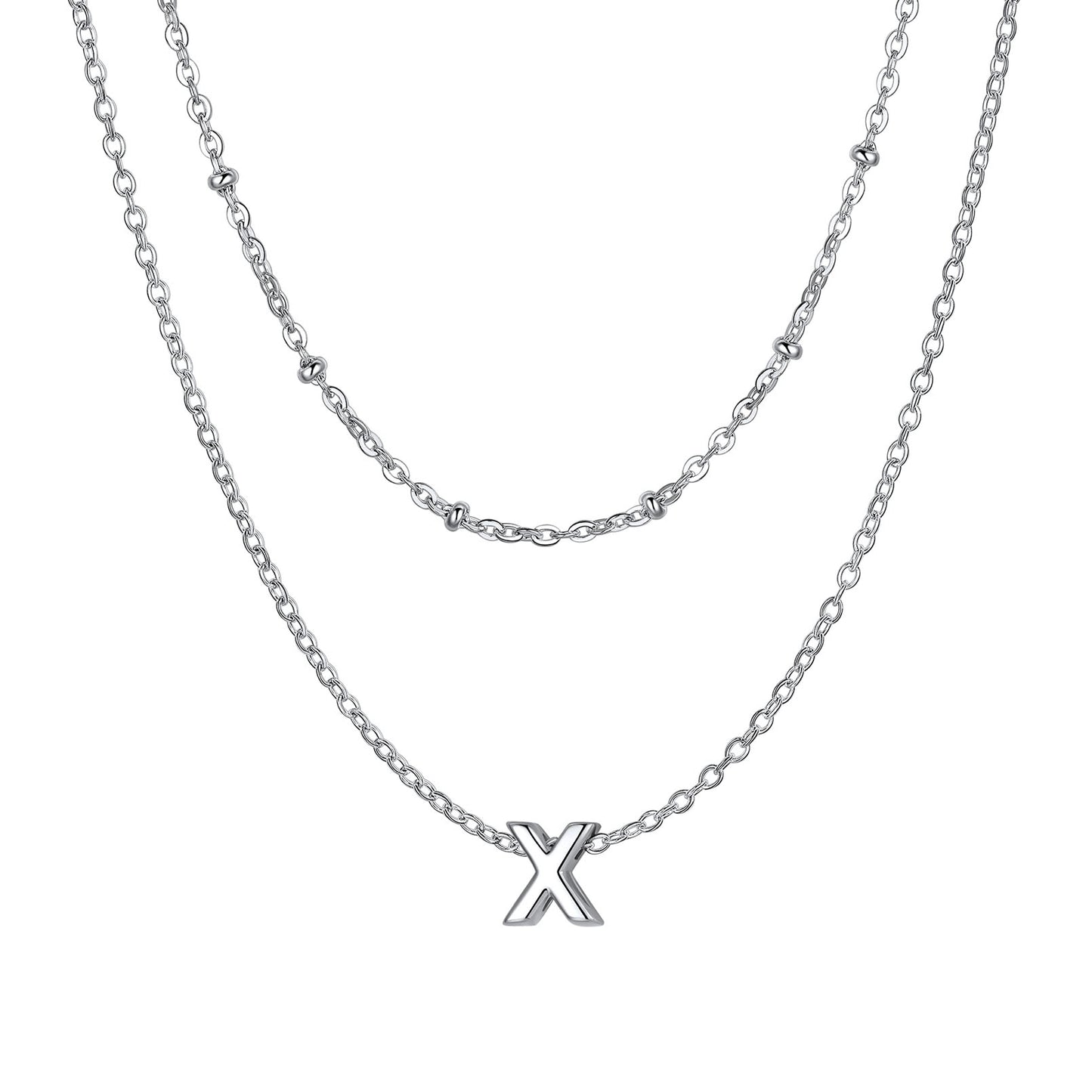 Silver Layered initial X necklace on a white background