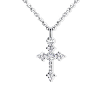 Silver cross pendant necklace on a white background