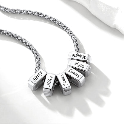 Silver custom engraved necklace on a white background
