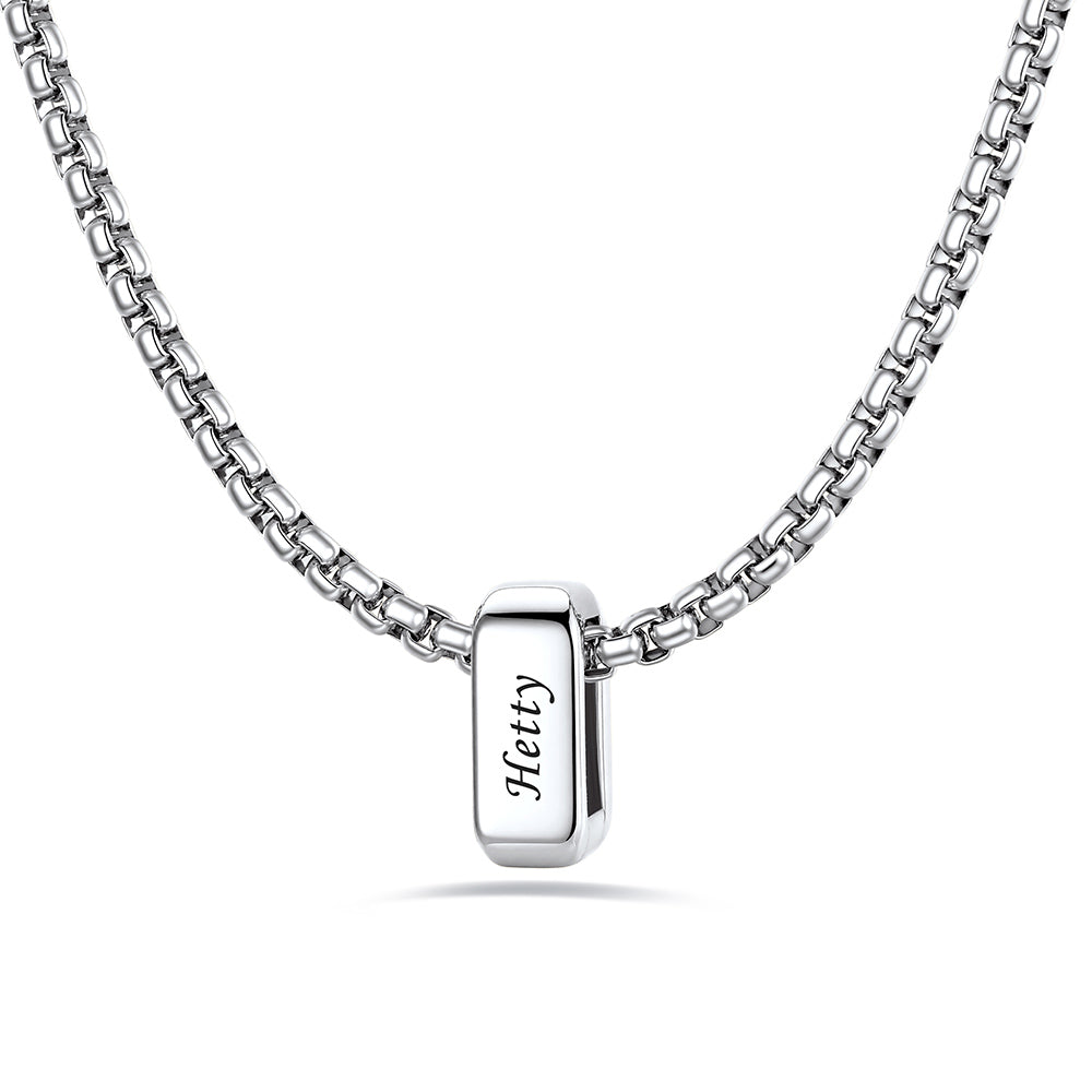 Silver custom name necklace with 1 rectangular pendant engraved on a white background