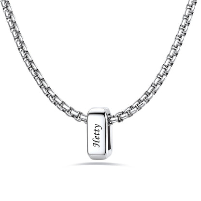 Silver custom name necklace with 1 rectangular pendant engraved on a white background