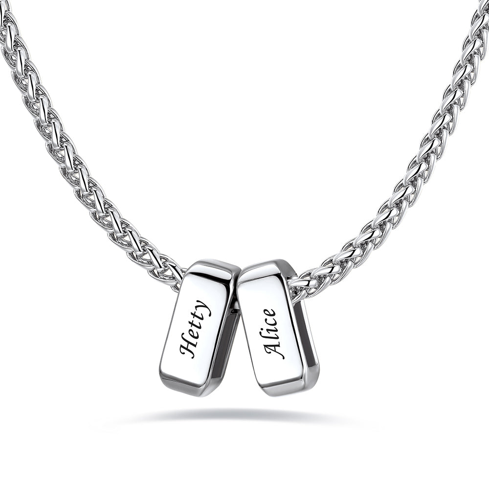Silver custom name necklace with 2 rectangular pendant engraved on a white background