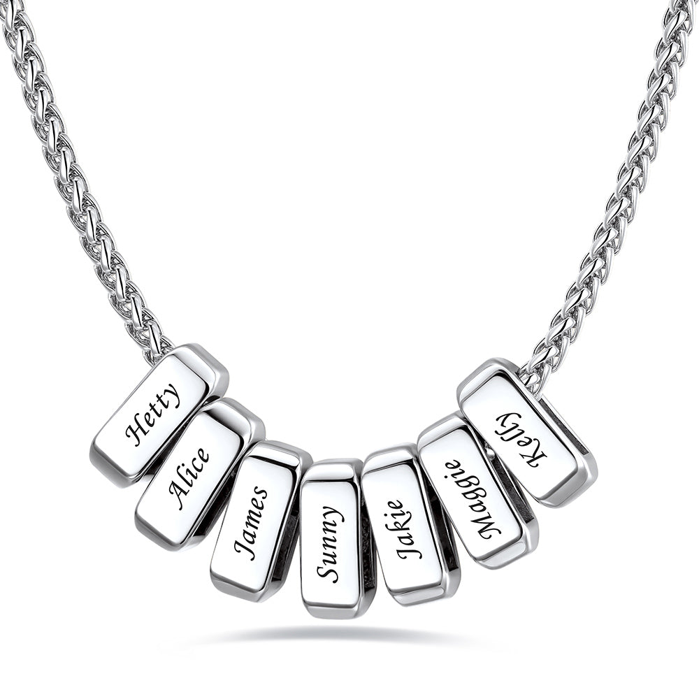 Silver custom name necklace with 7 rectangular pendant engraved on a white background