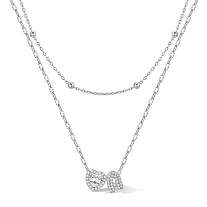 Silver cz bubble initial A necklace with a heart-shaped pendant on a white background