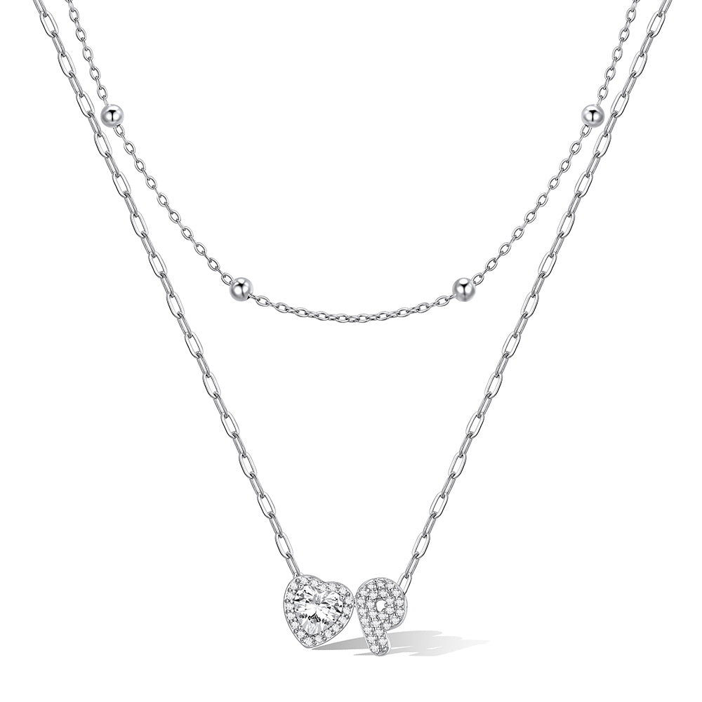 Silver cz bubble initial P necklace with a heart-shaped pendant on a white background