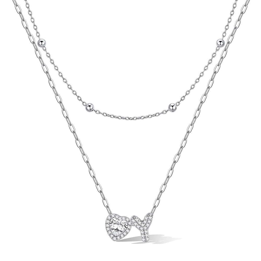 Silver cz bubble initial Y necklace with a heart-shaped pendant on a white background