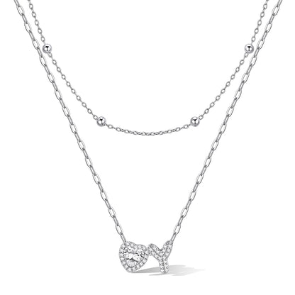 Silver cz bubble initial Y necklace with a heart-shaped pendant on a white background