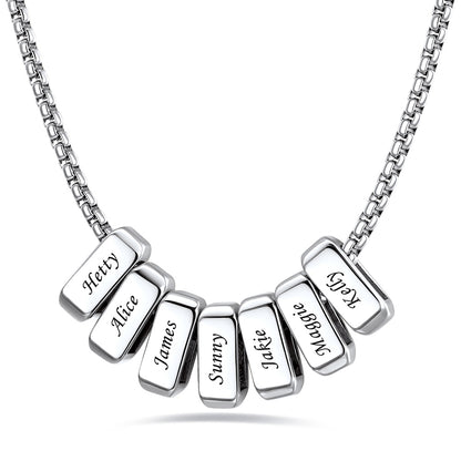 Silver engraved name necklace with 7 name bars on a white background