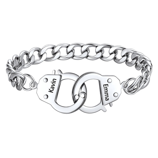 Silver handcuff chain bracelet with interlocking heart charms engraved with names on a white background