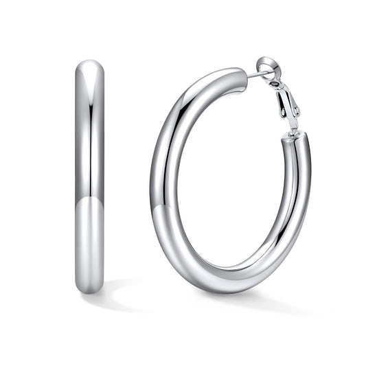 Silver hoop earrings on a white background