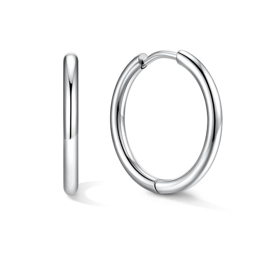 16mm Silver huggie earrings on a white background