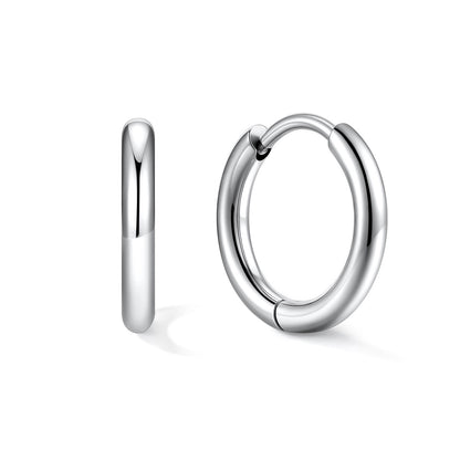 Silver huggie earrings on a white background 10mm