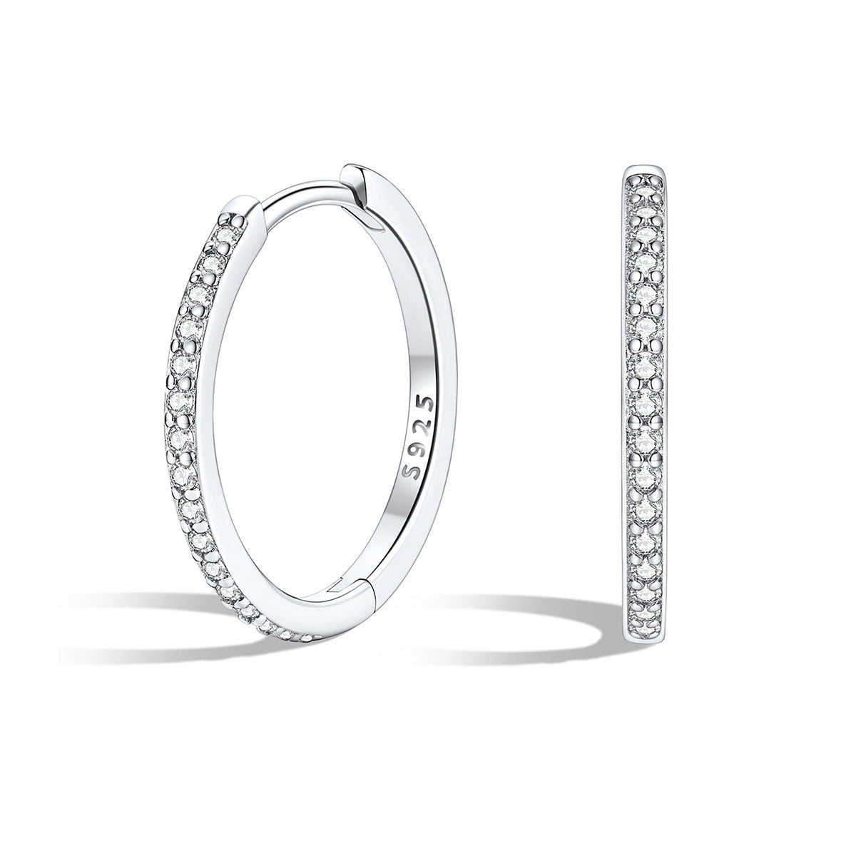 Silver huggie earrings with embedded stones on a white background