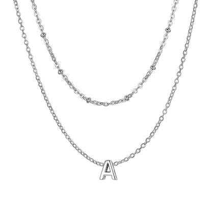 Silver initial necklace with a 'A' pendant on a white background