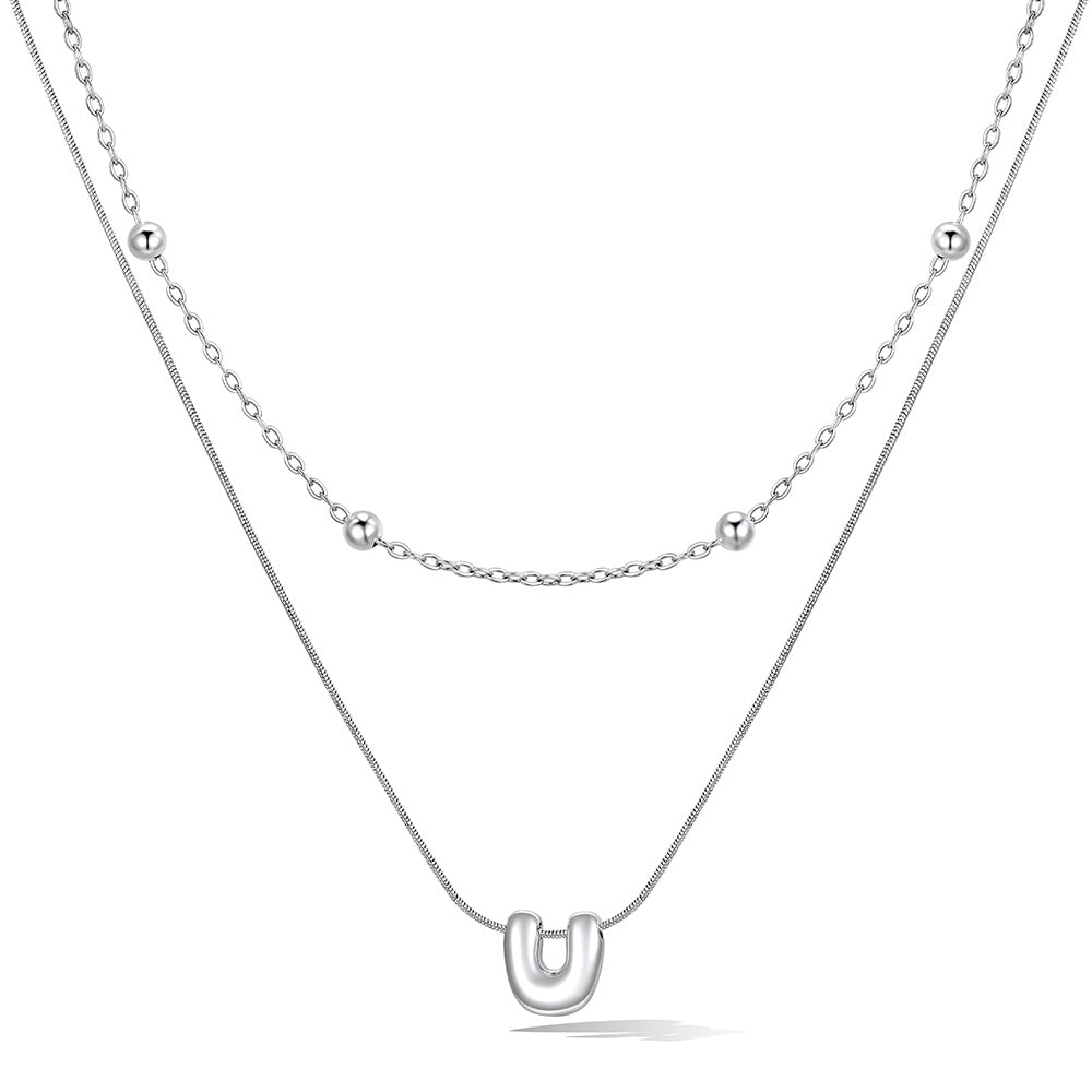 Silver layered initial U necklace, showing measurements and material details.
