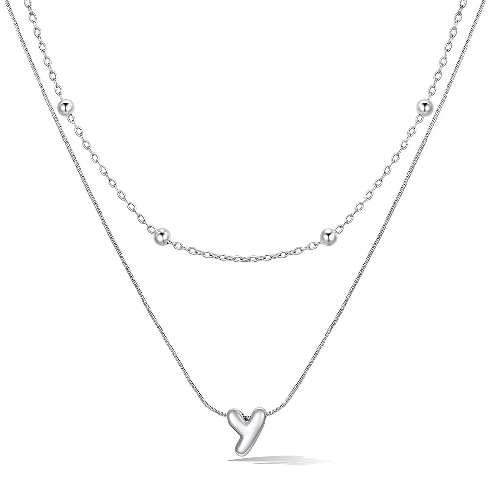 Silver layered initial Y necklace, showing measurements and material details.