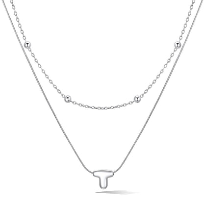 Silver layered initial t necklace, showing measurements and material details.