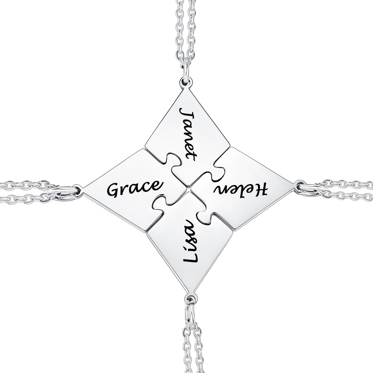 Silver matching puzzle necklace with puzzle piece pendants engraved with names on a white background