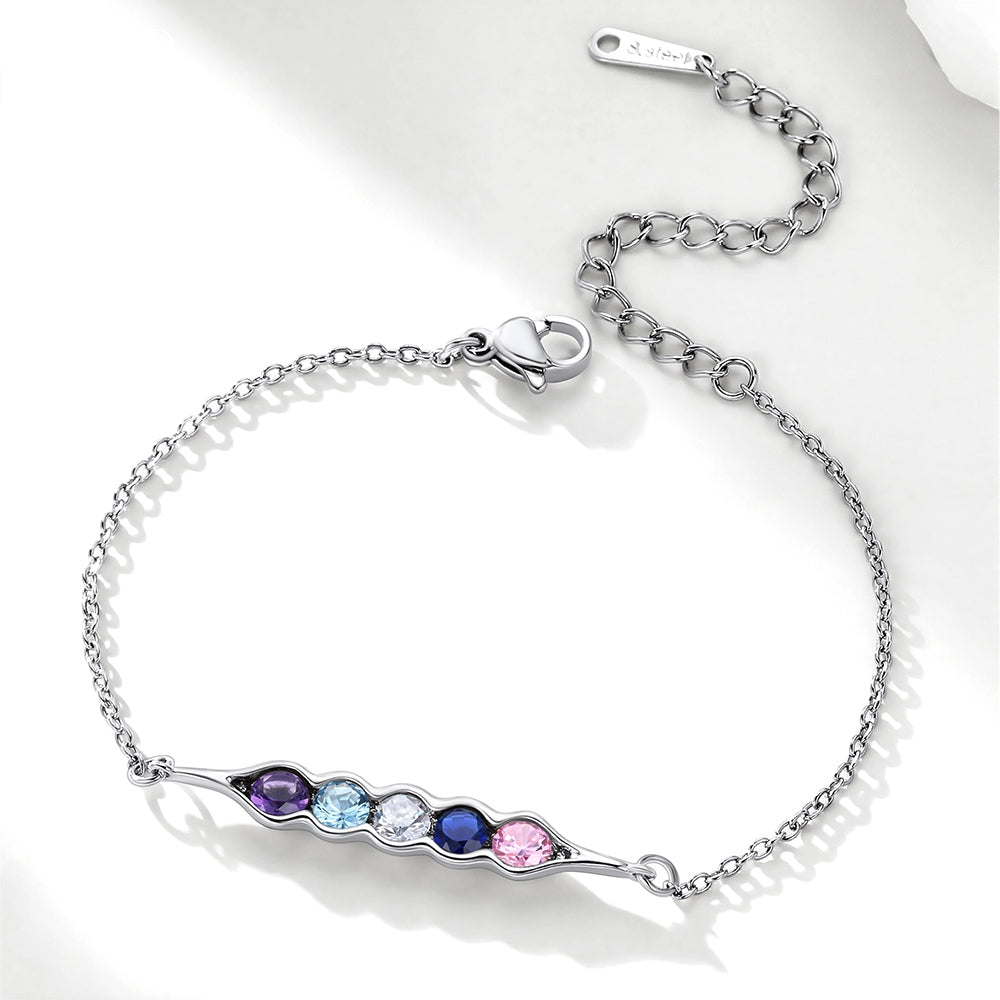 Silver pea in pot bracelet with colorful gemstones on a white background