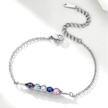 Silver pea in pot bracelet with colorful gemstones on a white background