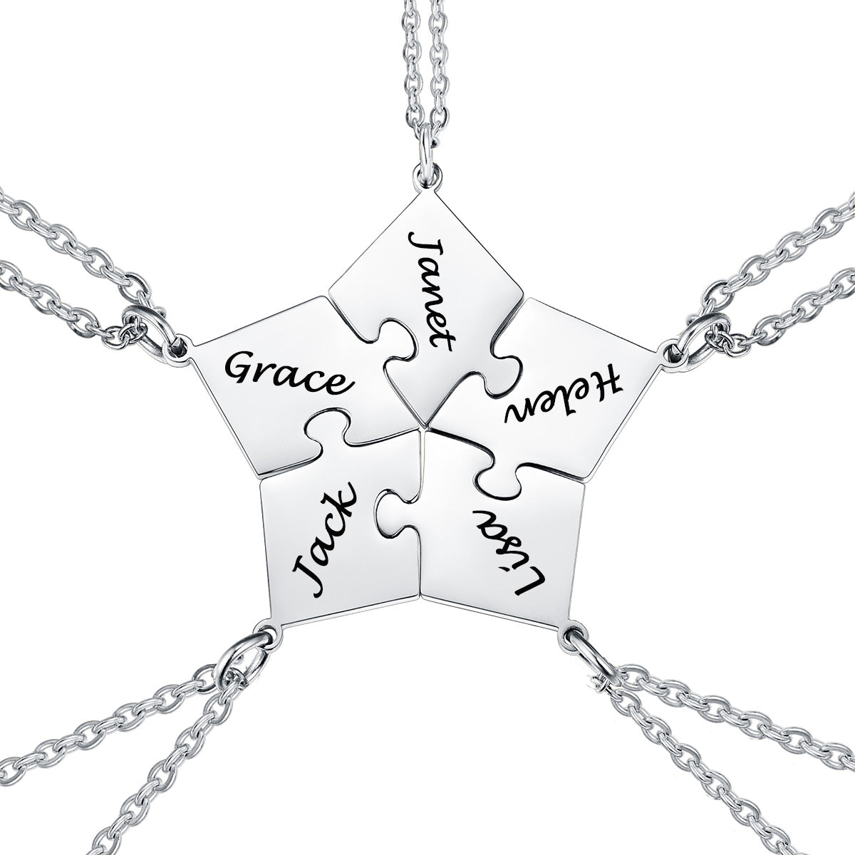 Silver puzzle piece necklace with engraved names on a white background
