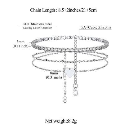 Silver tennis anklet bracelet with heart charm and measurement details on a white background