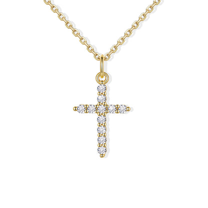 Gold CZ cross pendant necklace  on a white background