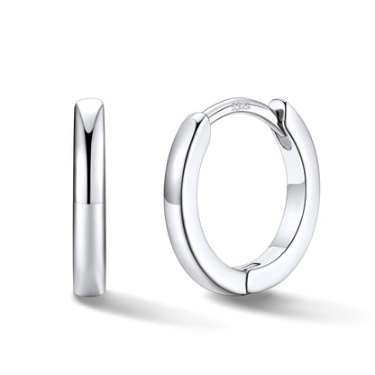 Silver hoop earrings on a white background