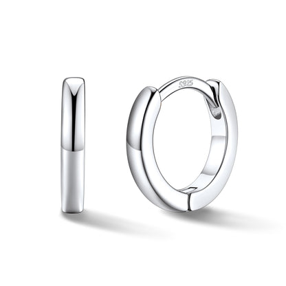 Silver hoop earrings on a white background