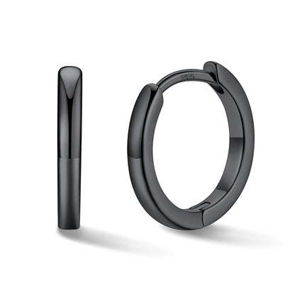 Black hoop earrings on a white background