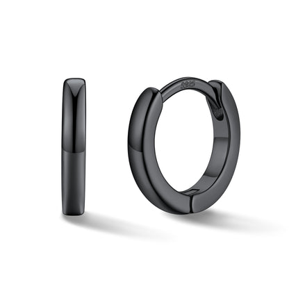 Black hoop earrings on a white background