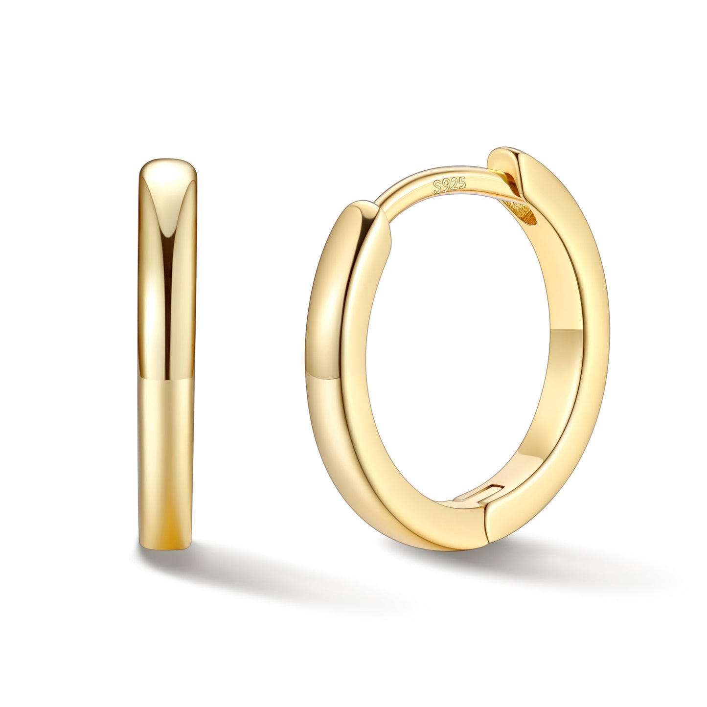 Gold hoop earrings on a white background