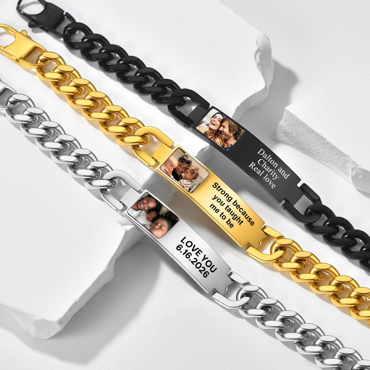 Three cuban link bracelets in gold, silver, and black with engraved messages on a white background.