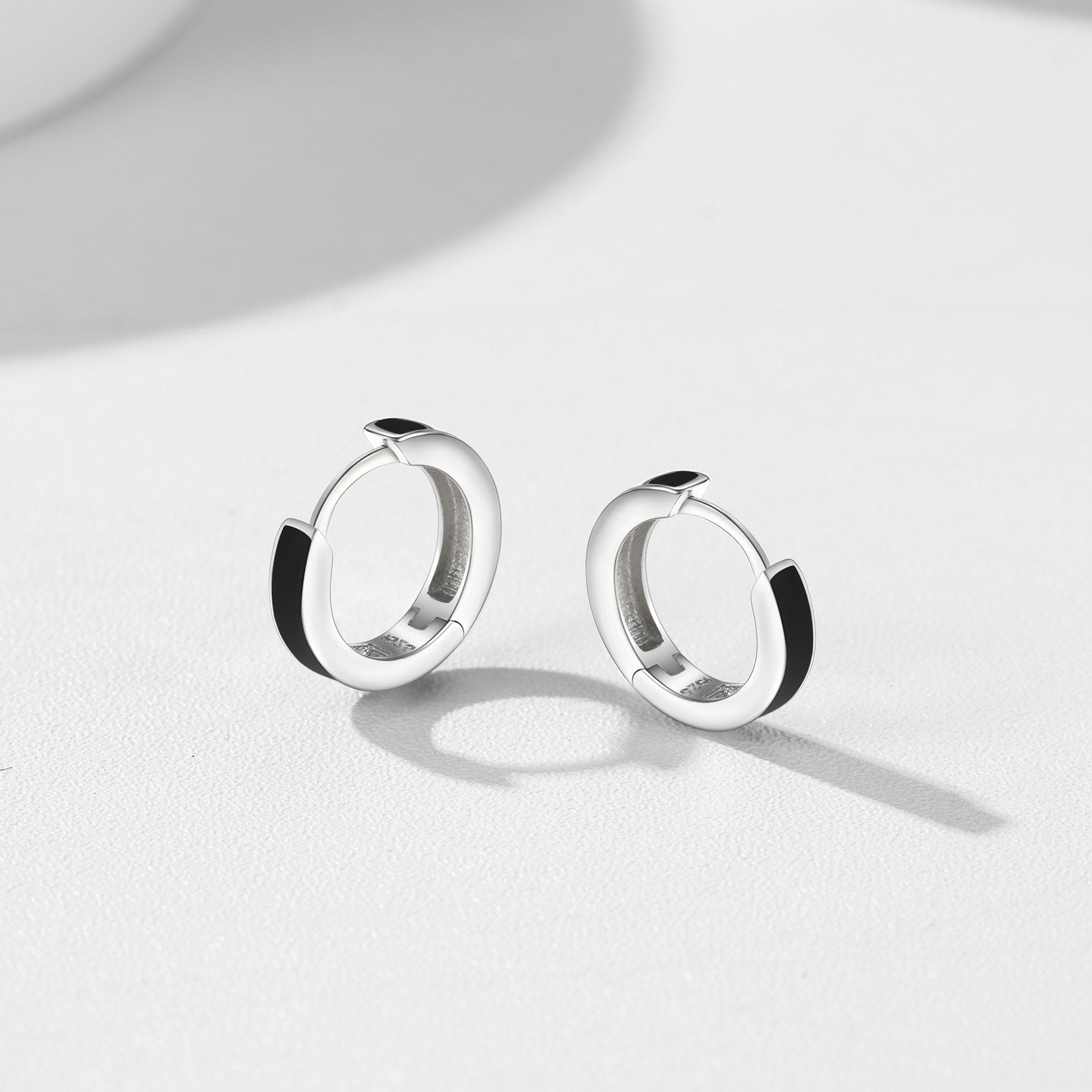 Tiny Huggie Hoop Earrings in Sterling Silver 