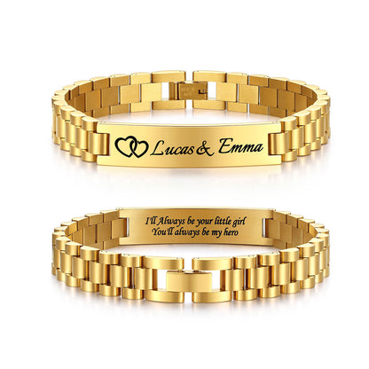 Two gold-tone metal link medical alert bracelets shown on a white background, one engraved with a heart and the name 'Lucas & Emma' and the other with the phrase 'I'll Always be your little girl You'll always be my hero' on the inside.