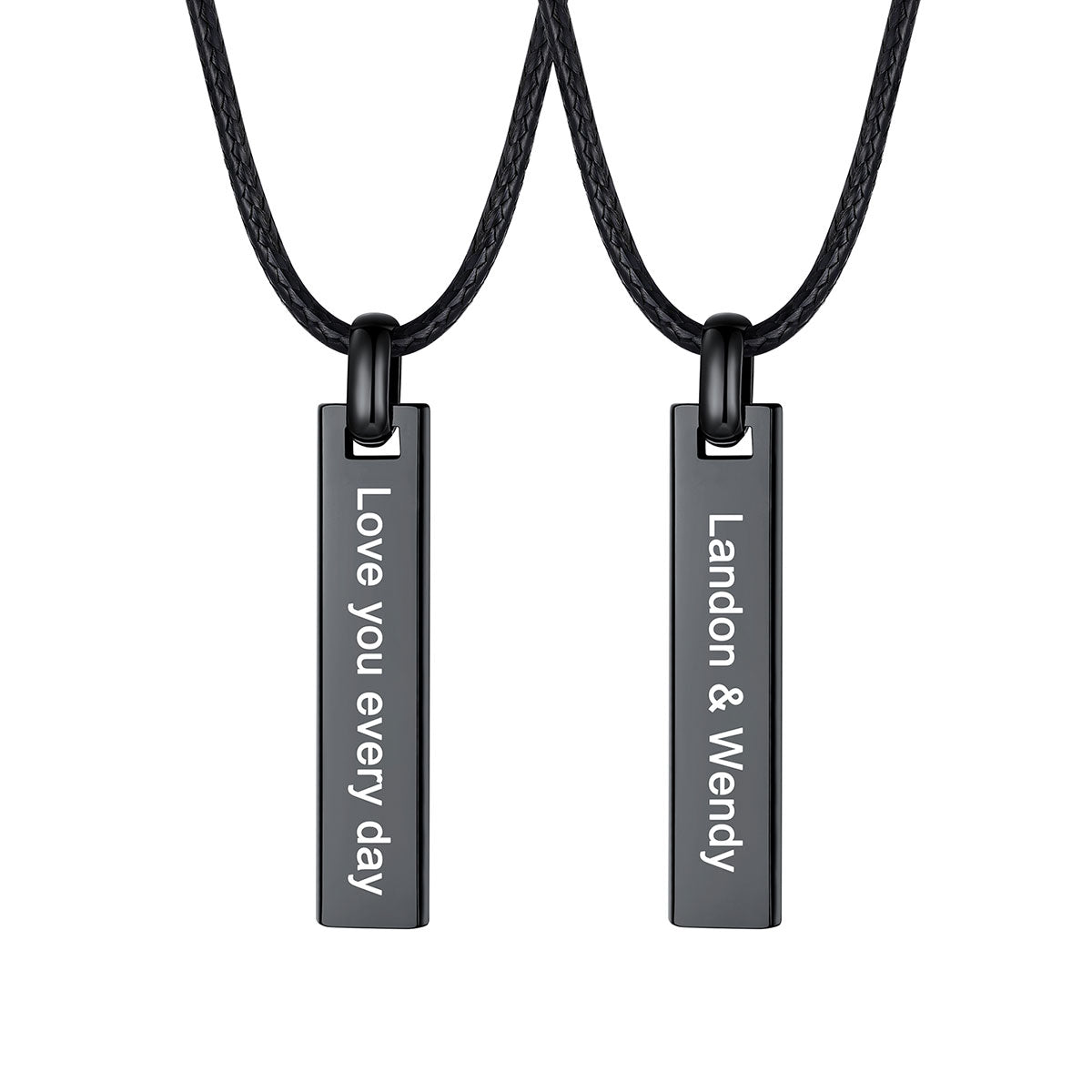 Two matching black rectangular engraved bar necklaces on black cords, shown against a plain white background. One pendant reads 'Love you every day' and the other reads 'Landon & Wendy'.