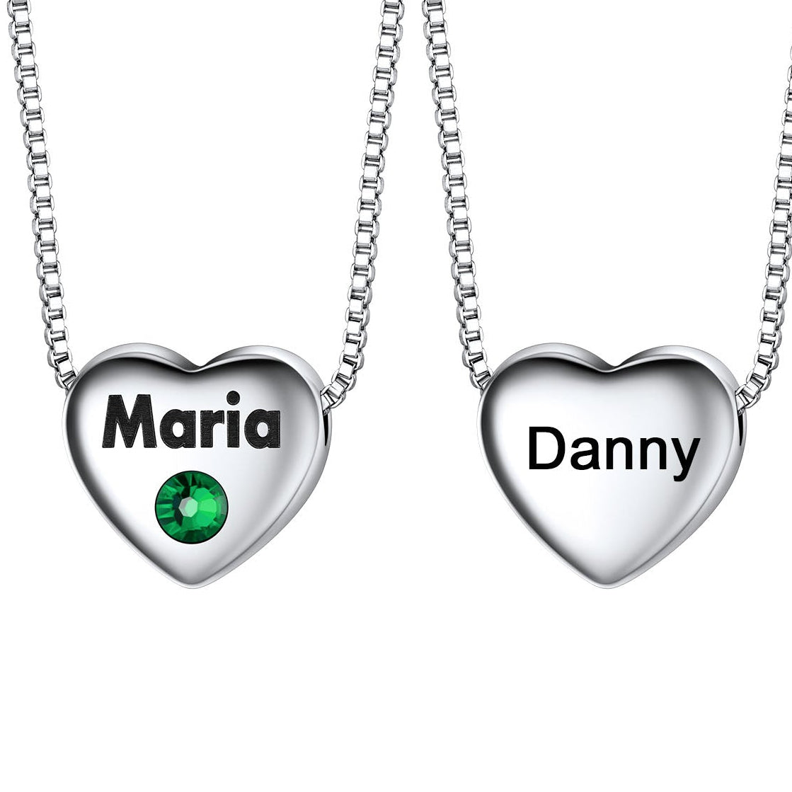 Two heart-shaped name pendants on silver chains with 'Maria' and 'Danny' engraved.
