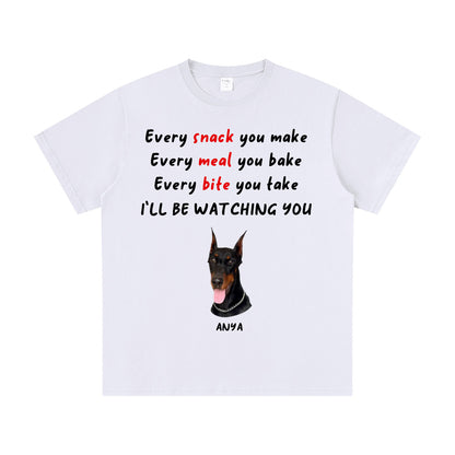 White t-shirt with a dog graphic and text on a white background