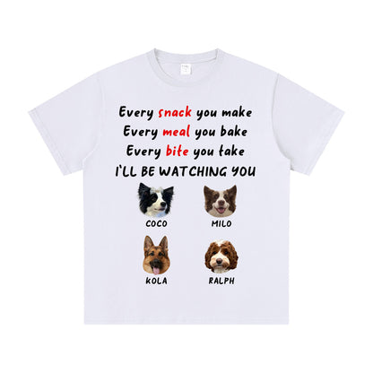 White t-shirt with dog illustrations and text on a white background