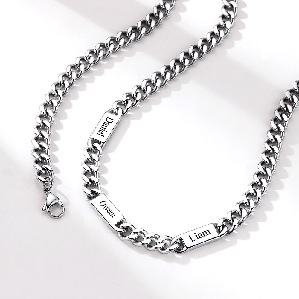 cuban chain name necklace with engraved names on a white background