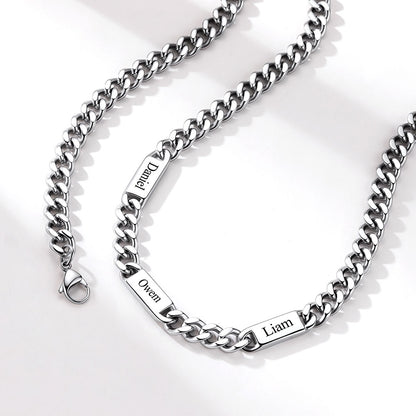 cuban chain name necklace with engraved names on a white background